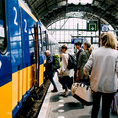 passengers boarding a European train