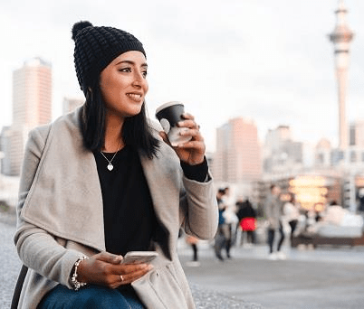 girl drinking coffee in Auckland