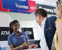 customers being served at a Travelex store